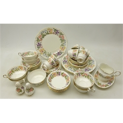  Paragon 'Country Lane' dinner and tea ware decorated with floral and gilt borders on white ground, comprising six twin handled soup bowls, milk jug, salt and pepper shakers etc (43)  