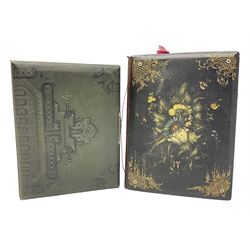 Victorian desk ink blotter, decorated with painted spray of flowers within stylised gilt rococo spandrels with mother of pearl fixings, together with a Victorian photo album containing interior leaves with apertures of various sizes and shapes of portraits surrounded by printed sea and dock scenes, blotter L28cm