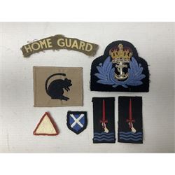 Royal Arms cloth arm adge as worn by Regimental Serjeant-Majors in Foot Guards; naval cap badge; WW2 Commando/Special Forces cloth badges; Home Guard and LDV shoulder titles; and other cloth badges including armoured division, 45th and 77th division, 52nd Lowland Mountain division etc; and 24th Infantry Brigade airmobile pennant