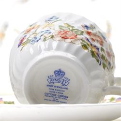 Aynsley Cottage Garden tea set comprising thirteen cups and saucers, eleven plates, bread and butter plate and milk jug, together with six coffee cans and saucers, cream jug and sugar bowl and four other Cottage Garden pieces