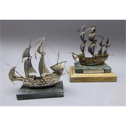  Hallmarked silver model of the Mary Rose on rectangular marble  base, hallmarked silver plaque, L14cm and a white metal model of a Galleon on polished stone plinth L13cm (2)  