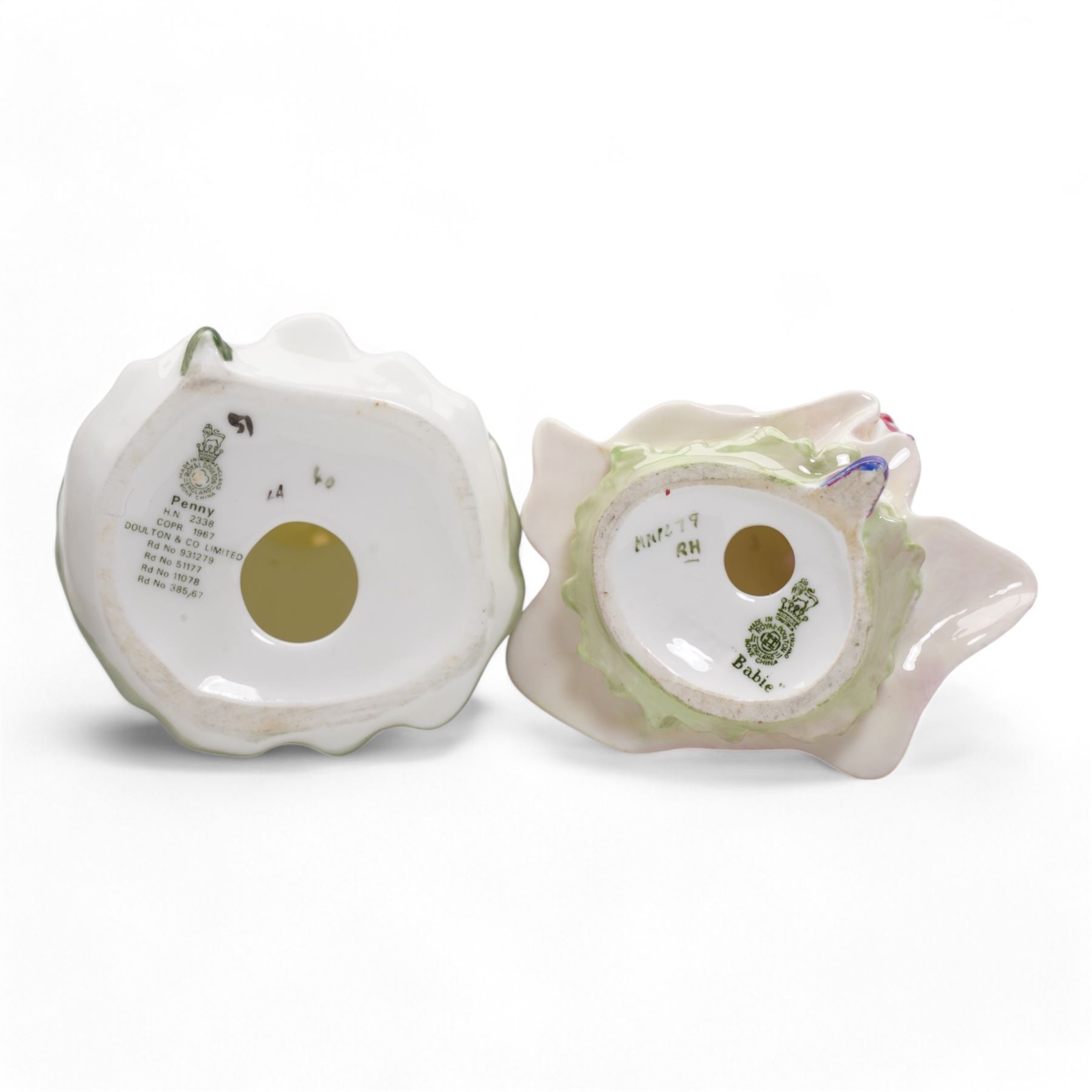 Royal Doulton figure, In the Stocks, HN2163,  H15cm, and four other Royal Doulton figures, To Bed HN1805, Babie HN1279, Wendy HN2109 and Penny HN2328 (second) (5)