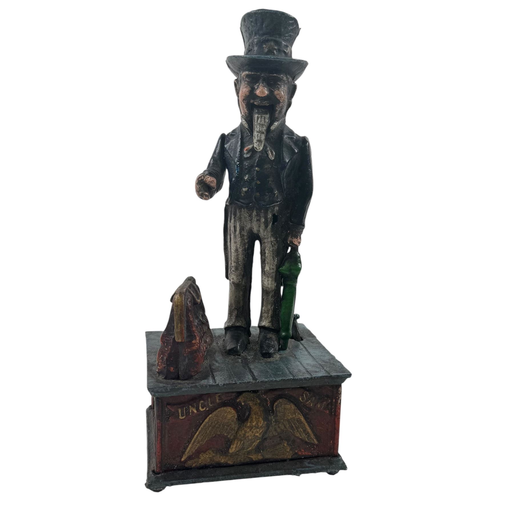  Uncle Sam mechanical money, together with The Monopoly collectors bank and Queen Elizabeth book  