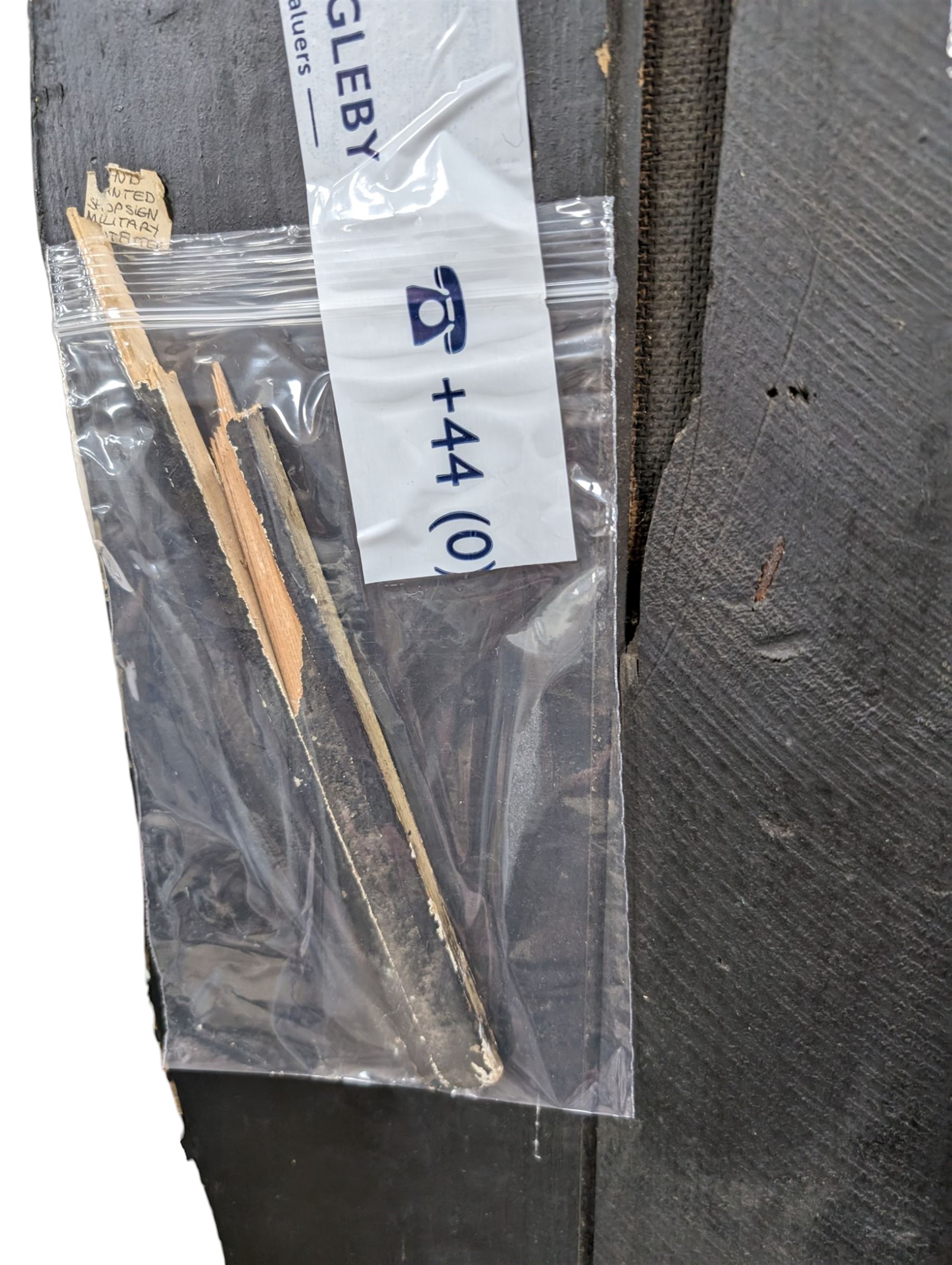 Military Outfitters hand painted life size wooden cut out figure of a WW1 soldier standing at ease holding a gun by his side, marked Stening Signs; hardboard on planked frame H199cm