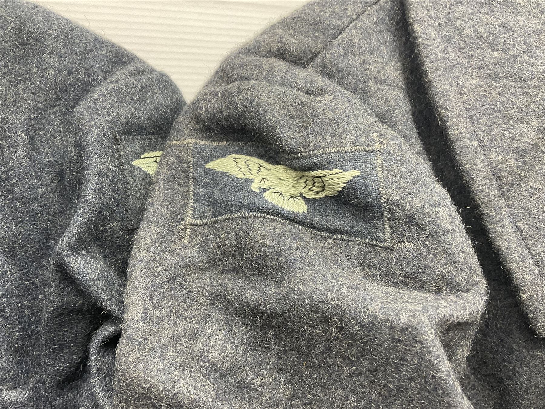 British RAF uniform, including jacket and trousers, modern RAF uniform buttons and a collection of reproduction wartime newspapers