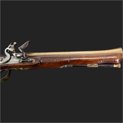 English flintlock blunderbuss, circa 1780 by R. Sutherland of London, the 32cm brass barrel with proof marks and London to the top, with original ramrod with brass tip below, the lock engraved Sutherland, walnut stock with brass butt plate, steel trigger guard with acorn finial, overall L70cm  