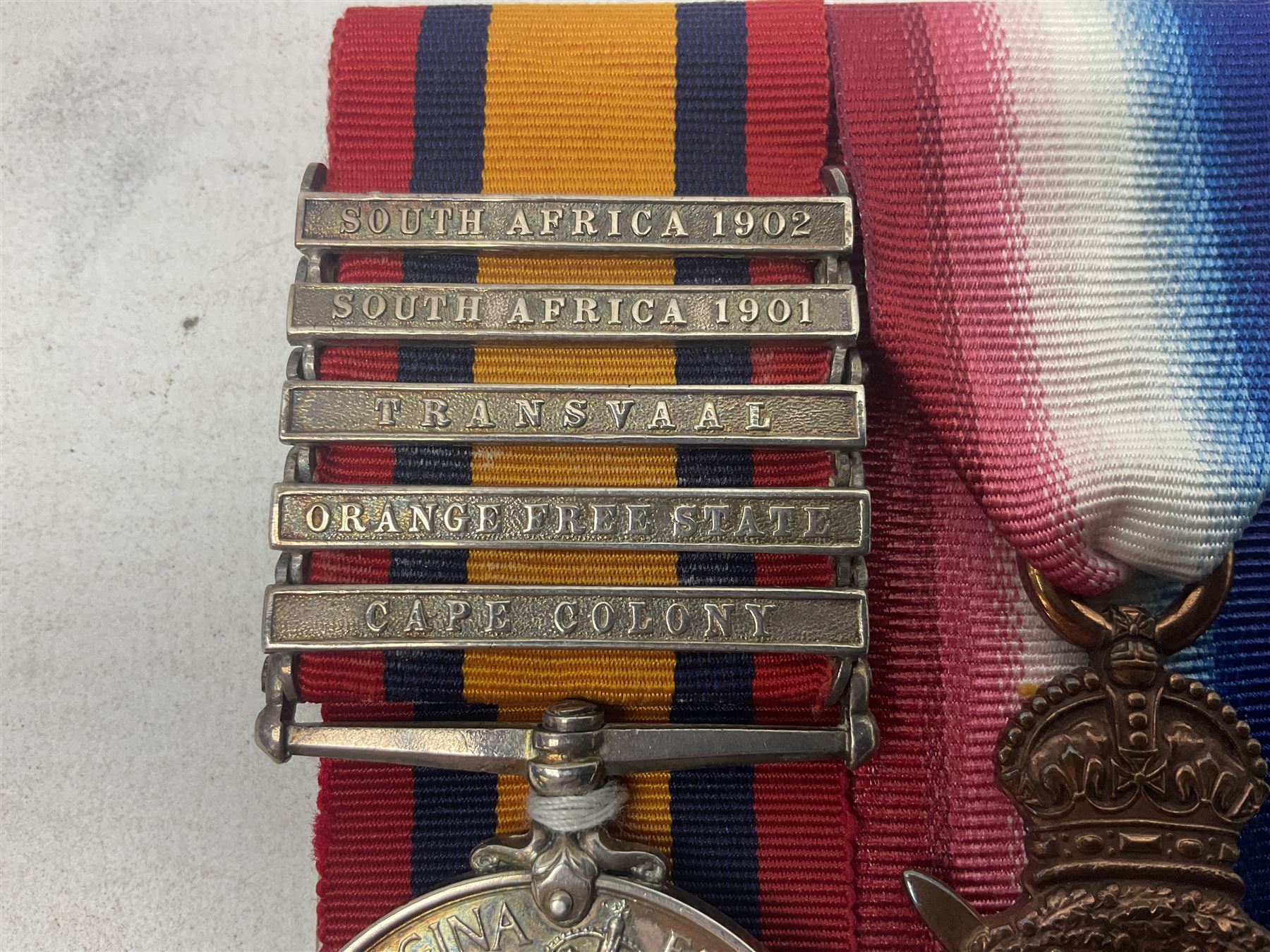 Boer War/WW1 group of four medals comprising Queens South Africa Medal with five clasps for South Africa 1901 & 1902, Transvaal. Orange Free State and Cape Colony awarded to 8321 Sapper J. Webb Rl. Engrs.; together with British War Medal, 1914-15 Star and Victory Medal awarded to 46989 2.Cpl. J. Webb R.E.; all with ribbons and mounted for display on card; some biographical details