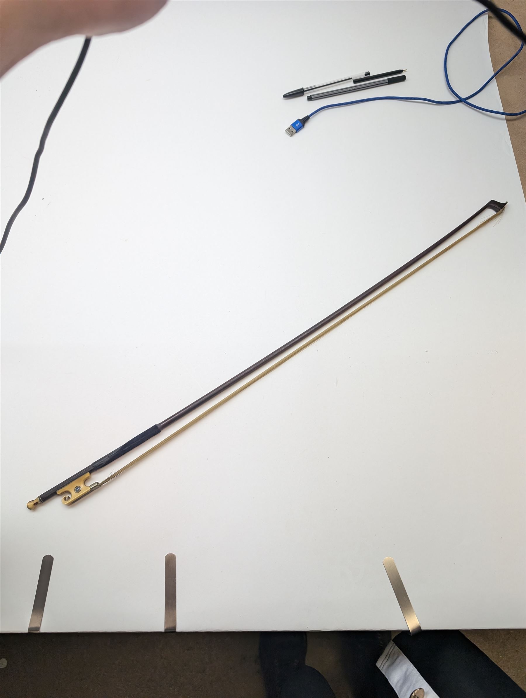 Late 19th century full size German violin with a  Wolff Brothers label, scroll with ebony pegs, finger board and tail piece, in a hard case with bow. Length 60cm

This item has been registered for sale under Section 10 of the APHA Ivory Act