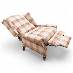 Laura Ashley - hardwood-framed wingback reclining armchair upholstered in checkered fabric, on turned and fluted front feet with brass cups and castors 