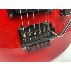 American Peavey Nitro 1 hand-made electric guitar in red with Kahler tremolo, serial no.02786479, L98cm overall; in soft carrying case.