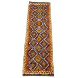 Chobi kilm runner, multi-colour ground, repeating stepped lozenge design