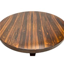Mid-19th century rosewood breakfast or centre table, circular tilt-top on tapered barrel pedestal, concaved triangular platform, on carved paw feet with castors 