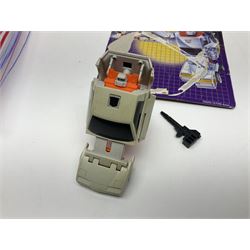 Four 1980sTransformer G1 - Optimus Prime 1984; DinoBot Sludge (Diplodocus) 1984; Cyclonus 1986; and Runamuck 1986; with paperwork; seven Bandai Robo Machines Robots/Transformers; almost fully stocked Panini Sticker album; two annuals; three comics; two posters; and Ladybird story book