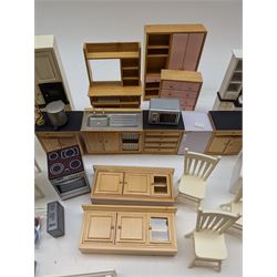 Modern 1:12 scale dolls house furniture, comprising pine kitchen set, with wall cabinets, floor cabinets and sink unit, white wooden bathroom suite, white wooden kitchen and dining room furniture and appliances, wooden bedroom furniture, Raine purple wingback chair, tv, desk, fish tank, etc