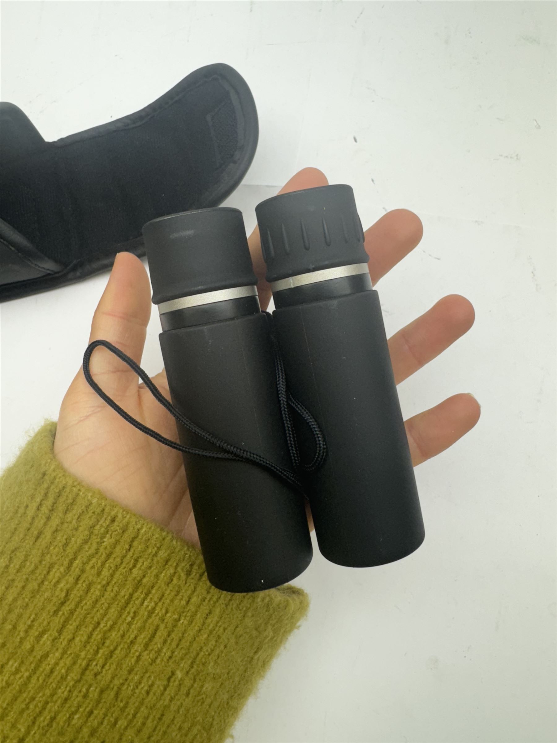 Four pairs of binoculars, to include Carl Zeiss Jena Jenoptem 8x30W serial no. 3750814, Nikon Sporting II 8x40 serial no. 604672, Minolta Pocket II 8x22 Field 7 and Jessops 12x25 Field 4.8 84m/1000m, all in carrying cases 