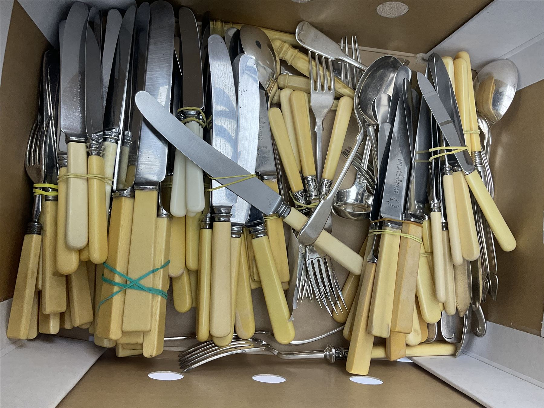 A silver plated part fluted meat dome with beaded rim, and unassociated Mappin & Webb base, together with two silver plated serving dishes and covers, one with oblique gadrooned detail, plus a quantity of mostly silver plated and ivory handled flatware. 