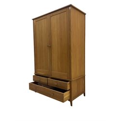 Light oak double wardrobe, three base drawers