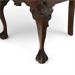 Chippendale revival mahogany dining chairs, set of six including a pair of carvers, the backs with intricately carved pierced splats beneath serpentine cresting rails, on acanthus carved cabriole front supports terminating in claw and ball feet, with cream upholstered drop-in seats