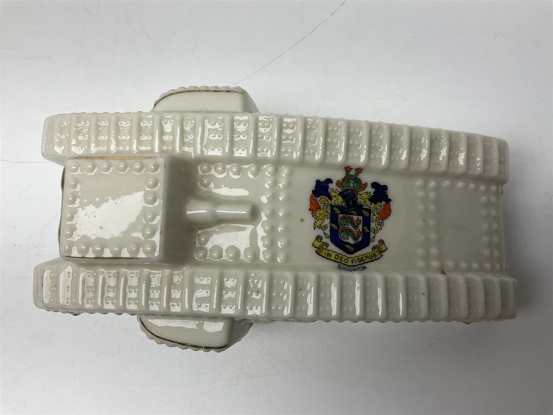 Ten WW1 crested china military models of tanks and field guns; various makers including Goss, Grafton China, Arcadian China, Savoy China etc; various crests including Portsmouth, Brighton, Pendleton, Paignton, Cowes, Flamborough etc (10)