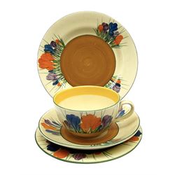 Clarice Cliff Bizarre Crocus pattern teacup trio, together with side plate, D17cm, all with stamped factory marks beneath (4)