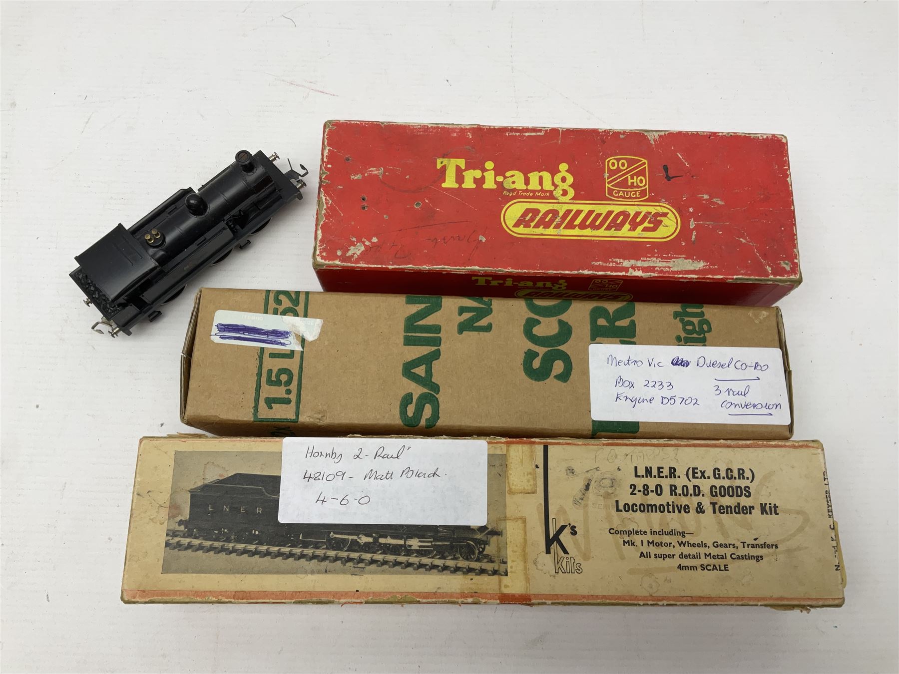 Hornby Dublo - 2-rail - Class 8F 2-8-0 locomotive No.48109 in BR black; Class R1 0-6-0 tank locomotive No.31337 in BR black; and Met-Vic Diesel Co-Bo locomotive No.D5702 in BR green; together with 3-rail Class 4MT Standard Tank 2-6-4 locomotive No.80054 in BR black; three unassociated boxes and one unboxed (4)