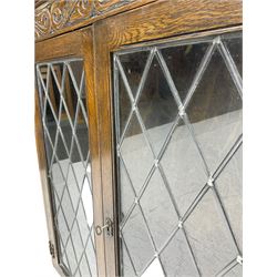 Oak bookcase with lead glazed doors
