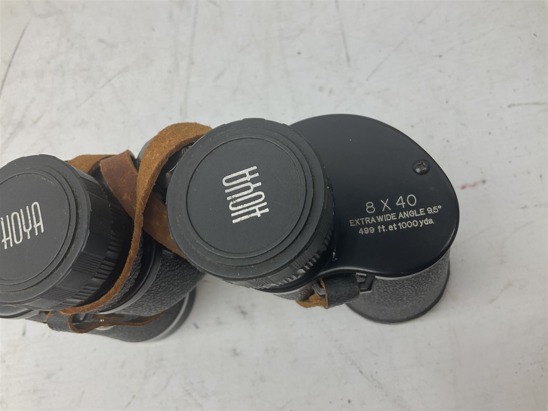 Nine cased pairs of binoculars to include Lieberman & Gortz 12x50, Frank Nipole 8x56, Uniscope, Hoya mark II 8x40, Porst 8x56 etc