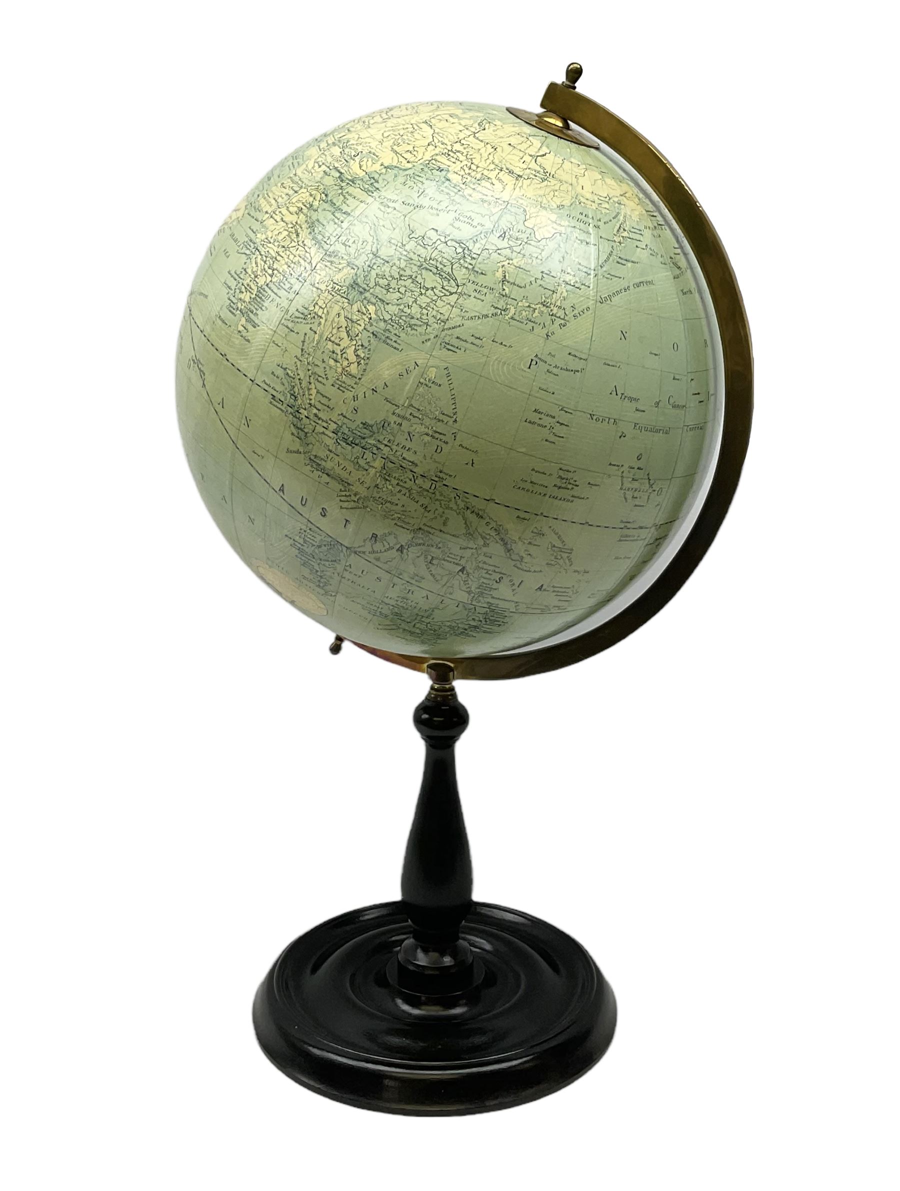 Terrestrial globe by Grinell, Washington, mounted on a brass half meridian and raised on turned wood pedestal base, H55cm