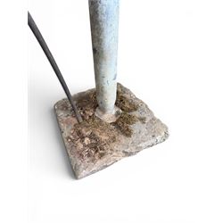 Georgian period lead garden water pump, with iron handle, set in square stone base