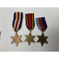Ten WW2 medals comprising two 1939-1945 war medals, two Defence medals, two 1939-1945 Stars, two Africa Stars, France & Germany Star and Burma Star; together with bar of four miniature medals; all with ribbons