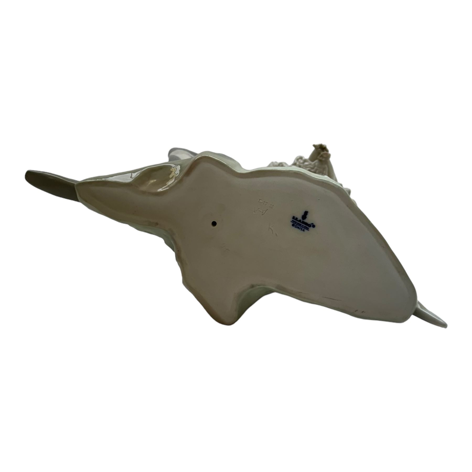 Lladro, Harlequin and ballerina, no 1017, together with The Nuns no 4611