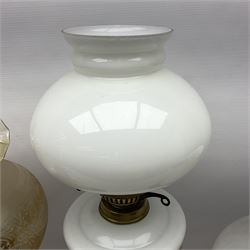 Brass Corinthian column oil lamp, upon stepped marble base, together three other brass table lamps, tallest H68cm