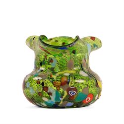Two Murano Glass jugs by Zecchin, the fist decorated with millefiori design, upon a purple mottled ground, the other upon a green ground, H10cm