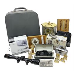 Kundo quartz clock, miniature brass clocks, two barometers, Sony digital camera, Nokia phone, Monarch Remington typewriter, commemorative Shilling etc