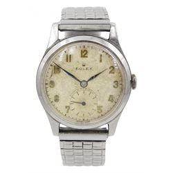 Rolex stainless steel manual wind shock resisting wristwatch, cream dial with subsidiary seconds dial, back case by Dennison case and engraved 'G.K.Ward 11.7.50', on expanding strap