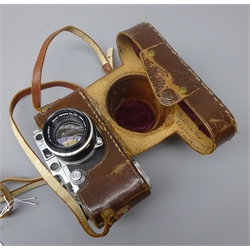  Leica 35mm film camera, Ernst Leitz Wetzlar D.R.P. No.326515, with Canon 50mm 1:1.8 No.320917 lens, in leather Leica case  