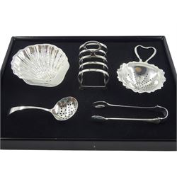 Silver toast rack by William Suckling Ltd, Birmingham 1938, silver scalloped dish , silver strainer by E J Houlston, pair of silver tongs and one other strainer, all hallmarked, approx 4.9oz