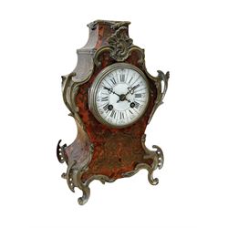French- late 19th century 8-day Boulle mantle clock with rococo brass mounts, enamel dial with segmented Roman numerals, five-minute Arabic's and matching steel hands, Parisian rack striking movement sounding the hours and half hours on a bell. With pendulum and key. 