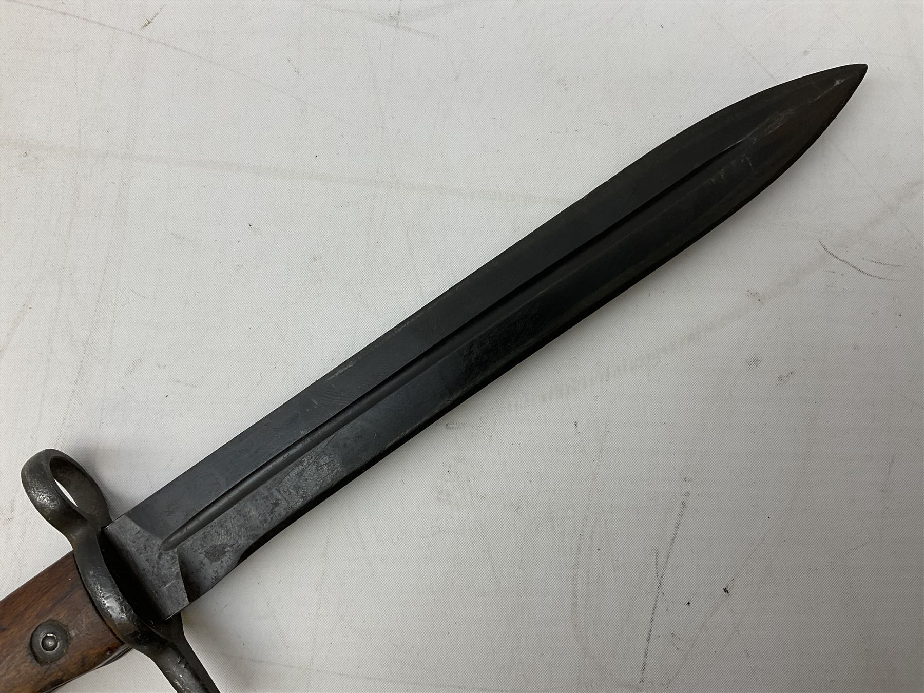 Swiss Model 1957 SIG rifle bayonet by Wenger with 23.5cm steel blade numbered 350857; in plastic scabbard with leather frog stamped GSCH 85 L38cm overall; and Egyptian Hakim rifle bayonet with the same script number to the grip and steel scabbard (2)