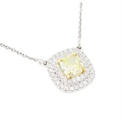 18ct white gold diamond pendant necklace, single cushion cut fancy yellow diamond of 1.05 carat, surrounded by a double halo of round brilliant cut white diamonds, to a fine trace link chain necklace, hallmarked, total white diamond weight 0.26 carat 