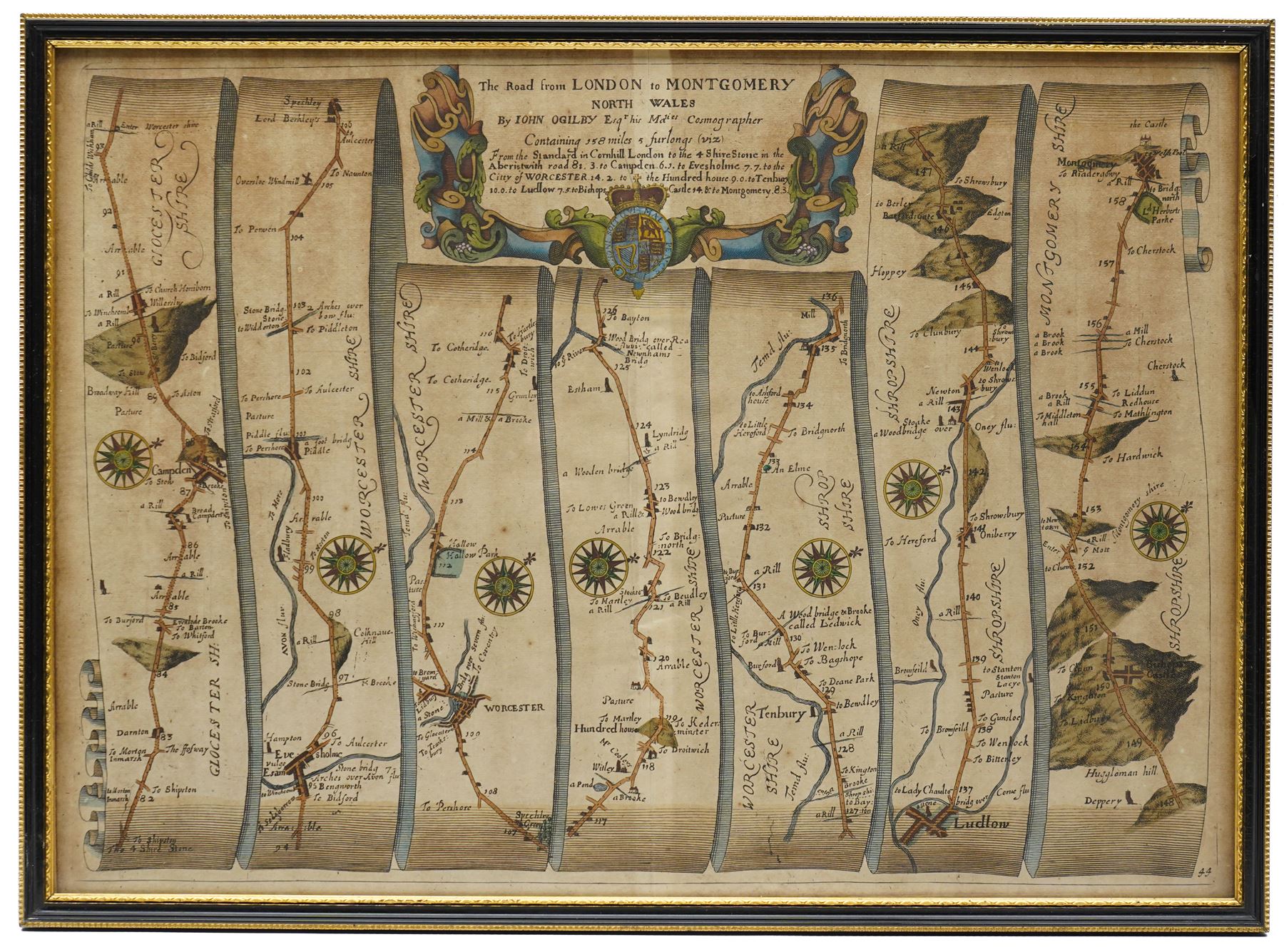 John Ogilby (British 1600-1676): 'The Road from London to Montgomery - North Wales', 17th century engraved strip map with hand-colouring 33cm x 46cm