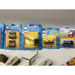 Ertl Thomas the Tank Engine and Friends die-cast models including carded Scrap Trevor, Slate Trucks, Neil, Wilbert, Sodor Taxi, Sodor Recovery Unit, Crane and four key rings; together with various uncarded models including locomotives, coal wagons, steam rollers, boat transporter, recovery units etc (over forty items)