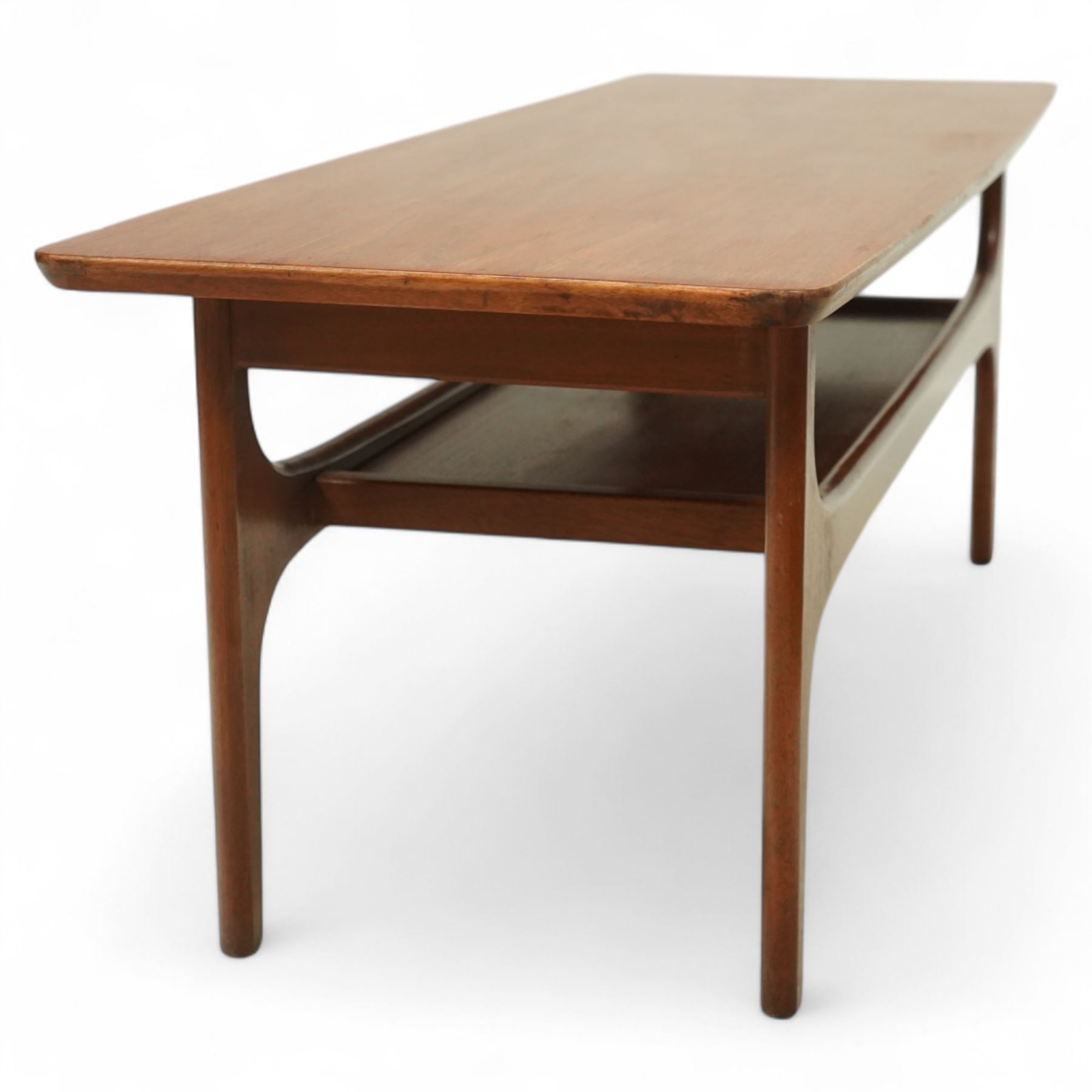 Jentique - Mid-century 'Stingray' teak coffee table, rectangular form with rounded corners, raised on shaped supports united by a magazine under tier 