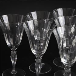 Set of six Murano clear glass wine glasses, each with part moulded fluted flared bowl, upon a knopped and fluted baluster stem and spreading circular foot, with etched marks beneath, H19.5cm