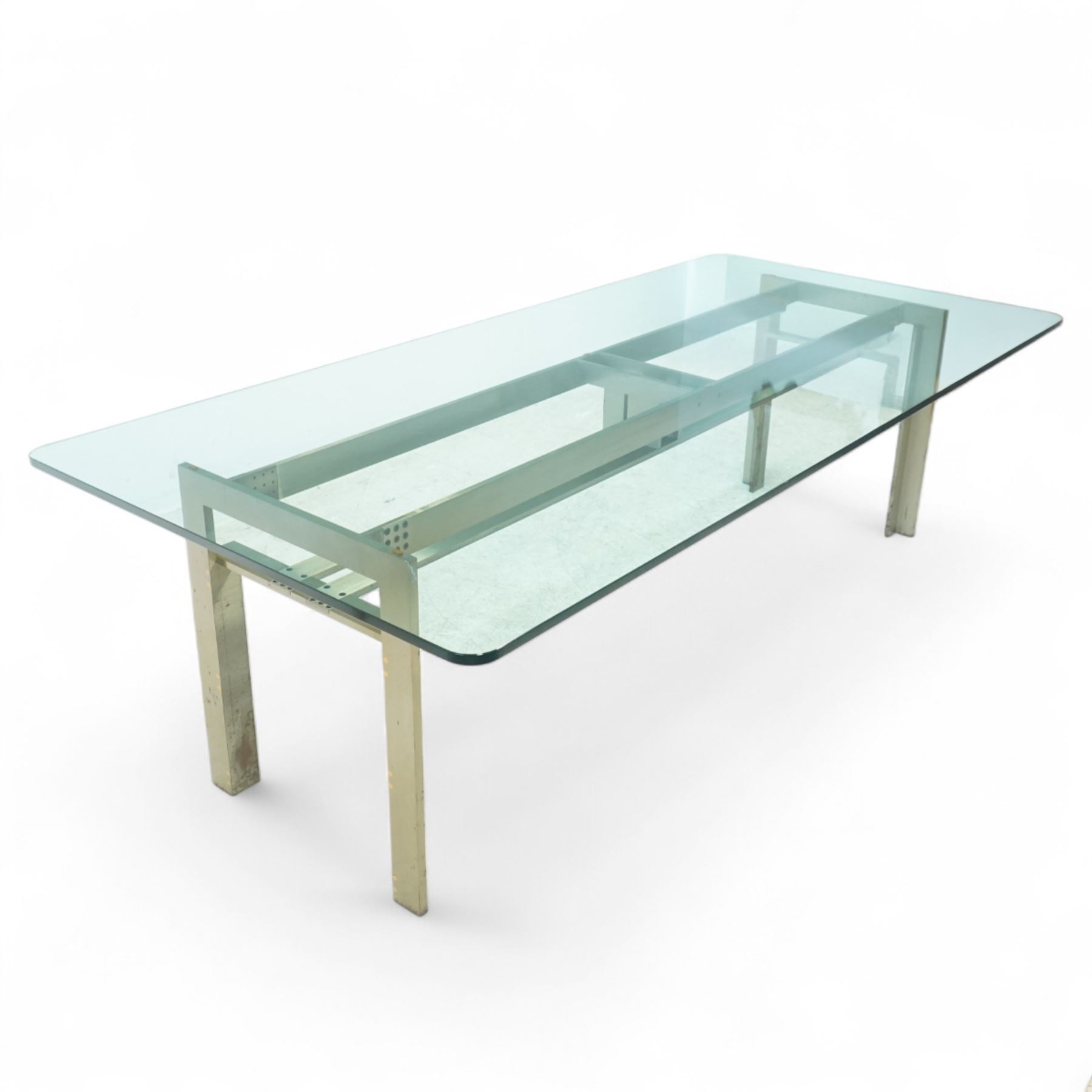 Carlo Scarpa for Studio Simon – 1970s Italian design dining table, the rectangular clear glazed top resting on a brushed steel and aluminium architectural base, with exposed bolt details and angled legs, maker's label with the designer's signature