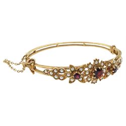 9ct gold garnet and split pearl flower design hinged bangle by Zeeta, stamped 9ct