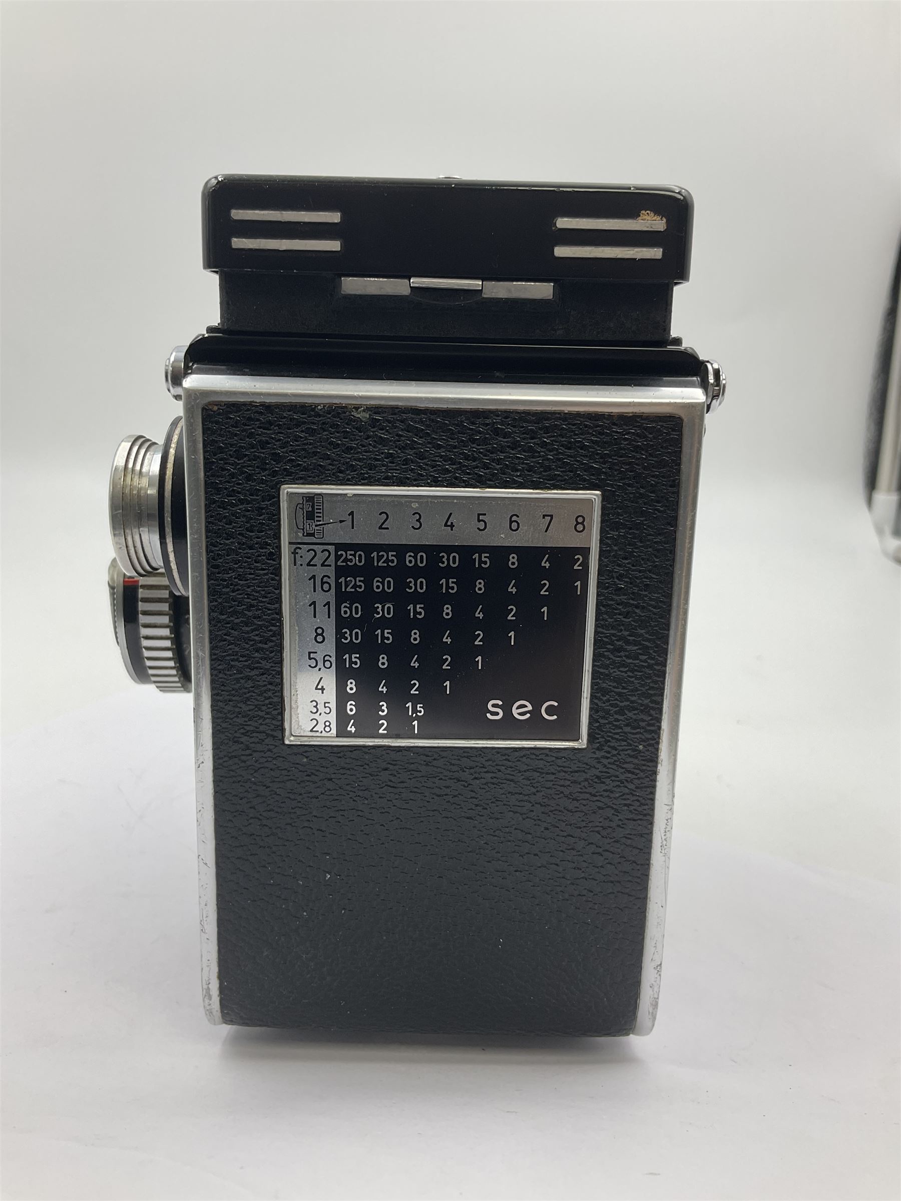 Rolleiflex Series E twin lens camera body, serial no. 1623867, with 'Planar 1.28 f-80mm' lens and 'Heidosmat 1:2.8/80' lens 