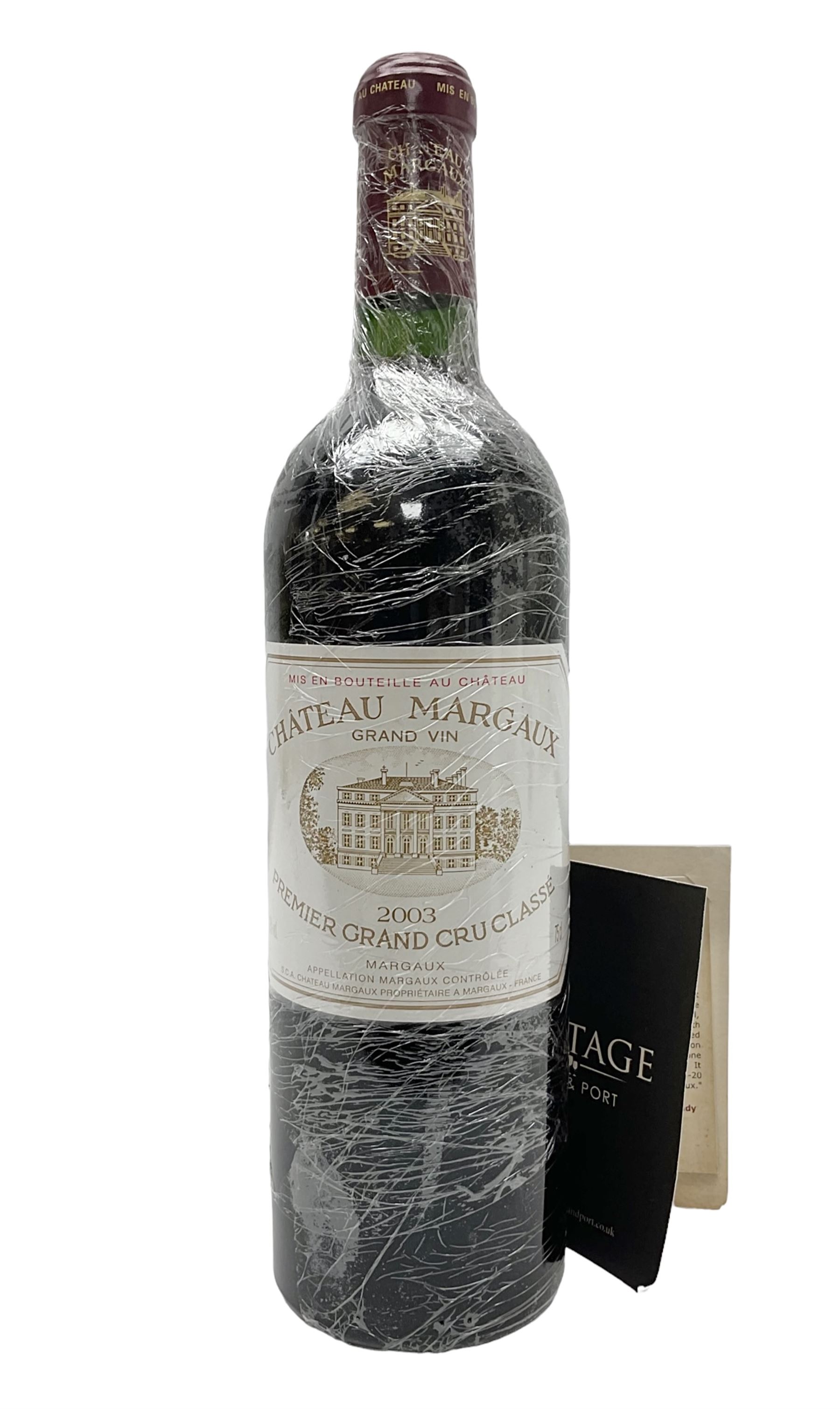 Chateau Margaux, 2003, Margaux, unknown content and proof, this bottle has depressed cork and signs of seepage