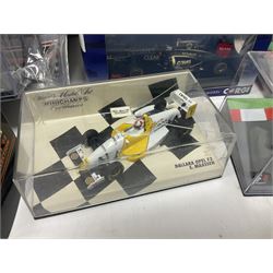 Panini Formula 1 The Car Collection - twelve die-cast models including ten in unopened packaging with periodical; all models in plastic display boxes; and eight other boxed die-cast models of racing cars by Corgi, Onyx, Classico, Minichamps etc (20)
