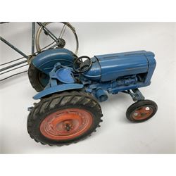 Chad Valley clockwork Fordson Major Tractor, a group of play worn Britains and other lead and metal farm animals, figures and accessories including a kennel, haystacks, dovecote, cows, sheep etc, together with a diecast model of a Tandem Bike L31cm